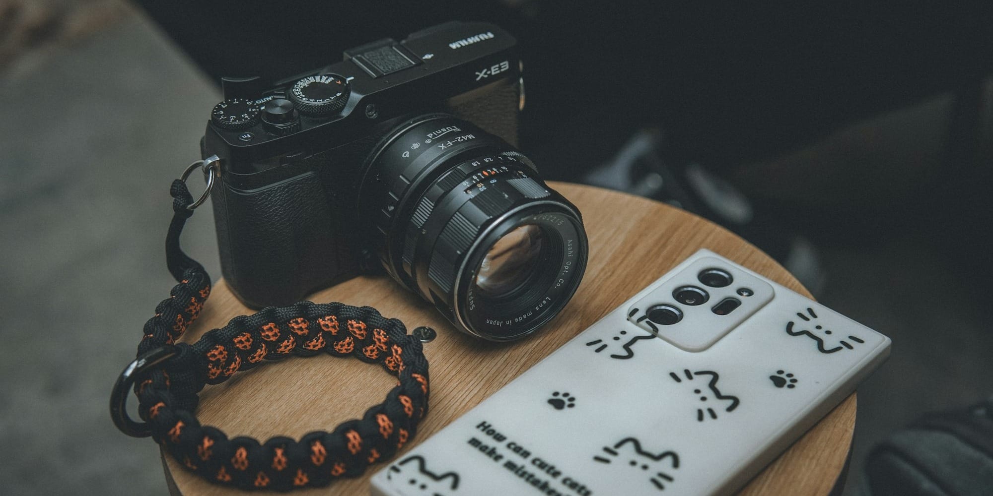 a camera sitting on top of a wooden table